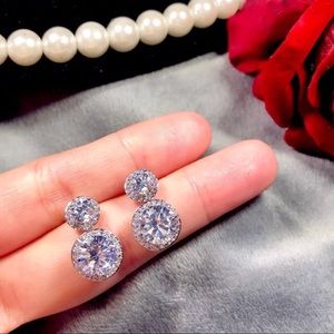 NWT Classic white gold plated crystal earrings.